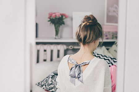 woman in white top showing back thumbnail