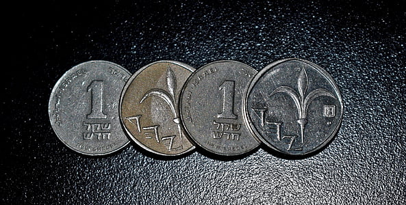 four round silver-colored coins thumbnail