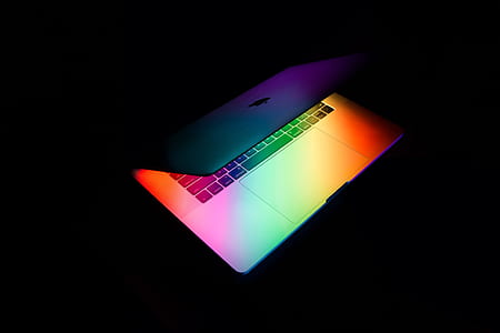 MacBook Air with orange, green, and purple LED thumbnail