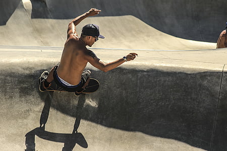 man skate boarding on skate park thumbnail