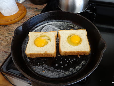 two slice bread with eggs on skillet thumbnail