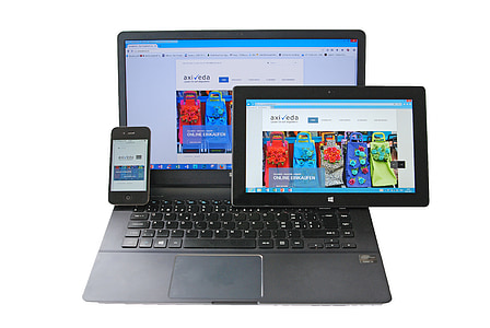 black laptop computer; black Microsoft Surface Pro 2 2-in-1 laptop; black iPhone 4 thumbnail
