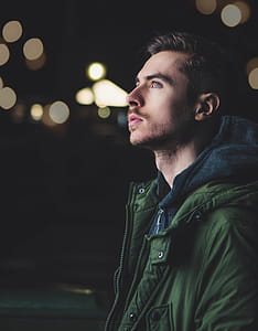 Man Wearing Green Zip Jacket thumbnail
