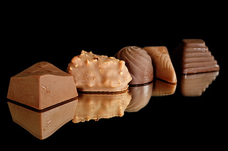 photo of five brown chocolates thumbnail