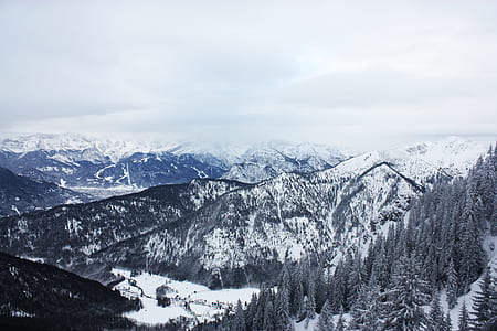 Scenic View of Mountains Covered with Snow thumbnail