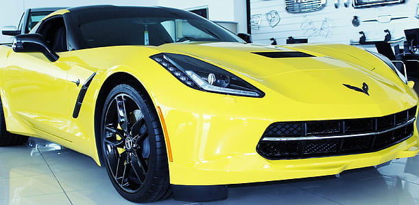 close-up photography of yellow Chevrolet Corvette C7 coupe thumbnail