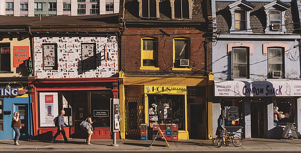 4 person standing beside the street during daytime thumbnail
