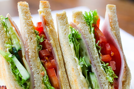close up photo of tomato, lettuce and ham sandwich thumbnail