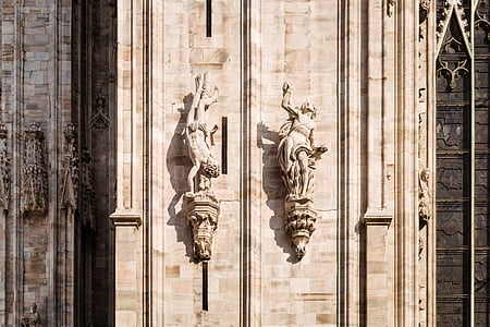 brown statue on wall thumbnail