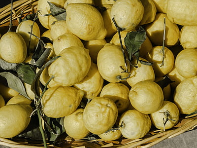 yellow lemons on wicker basket thumbnail