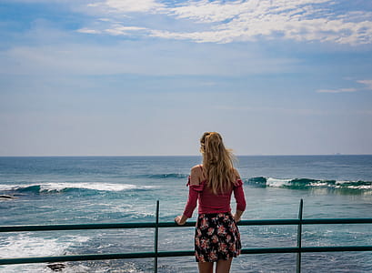 Person Standing on Terrace Facing Sea thumbnail