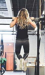 woman in black top doing exercise thumbnail