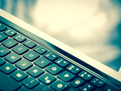 black laptop keyboard close-up photo thumbnail