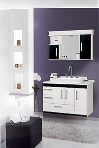 vase of white Tulip flowers beside combo vanity sink inside room thumbnail