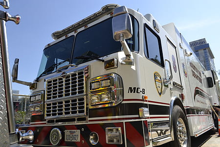 white MC8 trailer truck under blue sky thumbnail