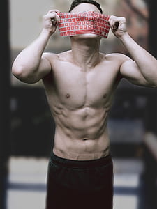 shirtless man putting silicone keyboard on his face thumbnail