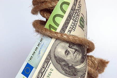 close-up photo of two banknotes thumbnail