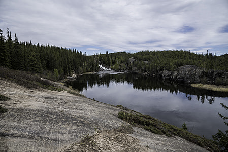 Landscape of the Cameron River with the waterfall in the distance on the Ingraham Trail thumbnail