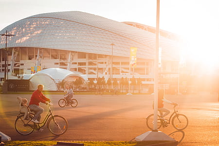 three person riding bikes thumbnail