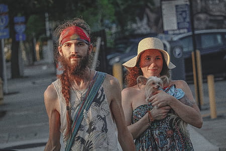 Man And Woman Standing On Sidewalk thumbnail