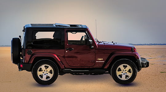 maroon Jeep Wrangler SUV thumbnail