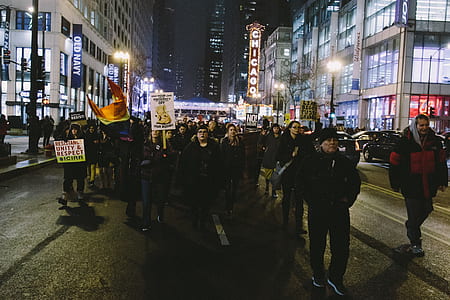 people walking protesting in the street thumbnail