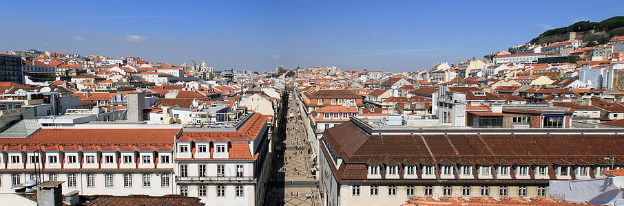 aerial photography of brown-and-white concrete building under blue sky thumbnail