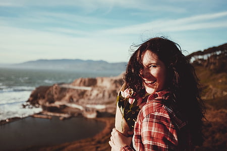 woman wearing red and white plaid collar top thumbnail