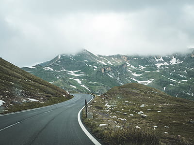 Gray Concrete Pavement Under White Cloudy Sky thumbnail