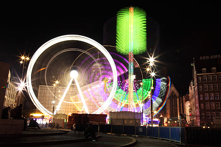 time-lapse photography of Ferris wheel during nighttime thumbnail