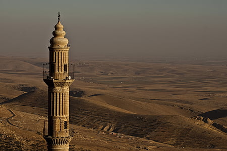 brown concrete tower at daytime thumbnail
