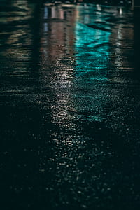black concrete pavement at night time thumbnail