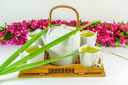 white ceramic 5-piece tea set placed on beige wooden tray thumbnail