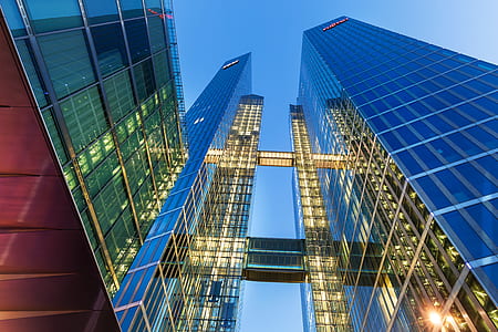 low-angle photography of clear building thumbnail