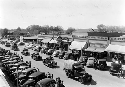 Parade of vehicles from Civilian Conservation Corps in Lovell Wyoming thumbnail