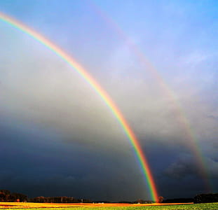 Photography of Rainbow During Cloudy Sky thumbnail