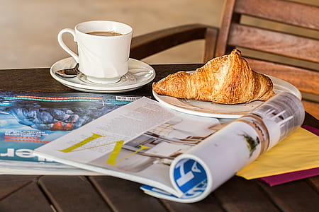 croissant on white ceramic plate thumbnail