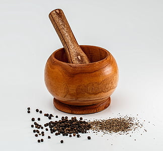 brown wooden mortar and pestle thumbnail