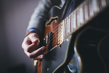man playing guitar thumbnail