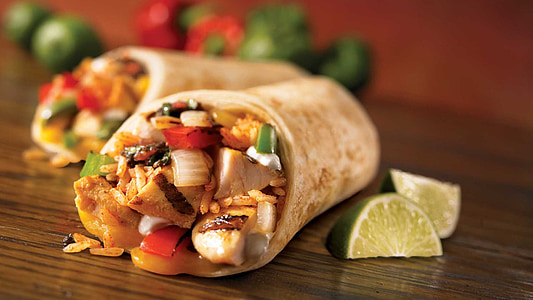 burrito on brown wooden board thumbnail