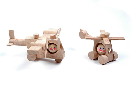 two brown wooden toys collage thumbnail