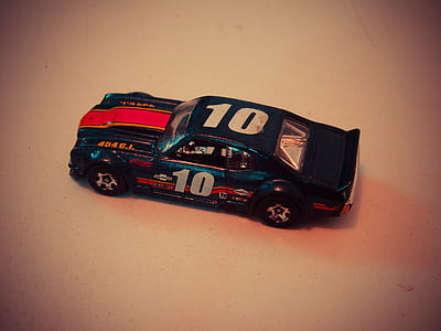 Teal Red and White Die Cast Model of Racing Car thumbnail