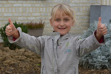 girl wearing gray zip-up jacket thumbnail