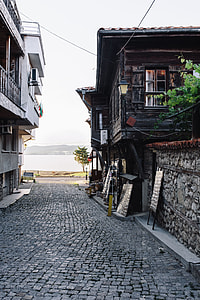 Narrow streets with old houses in the old town Nessebar, Bulgaria thumbnail