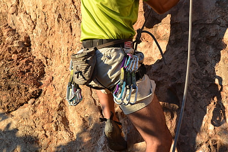 person climbing on mountain thumbnail