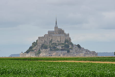 Mont Saint-michel Under White Clouds and Blue Sky thumbnail