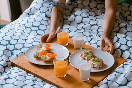 assorted food with drinks on tray thumbnail