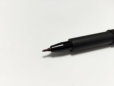 black pen on white surface thumbnail