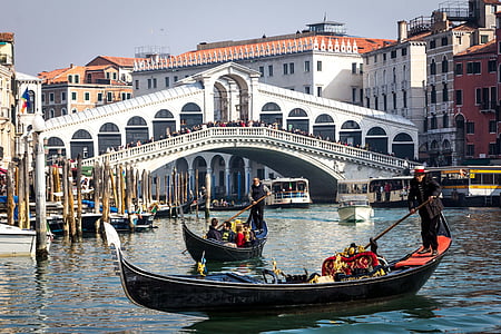 two black canoes on Rialto Bridge, Italy thumbnail