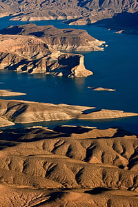 aerial photography of island in body of water thumbnail